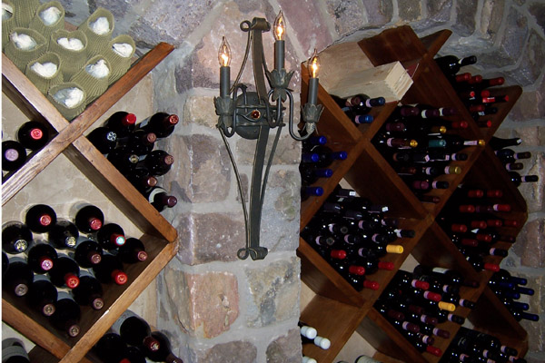 A wall of wine bottles in the cellar.